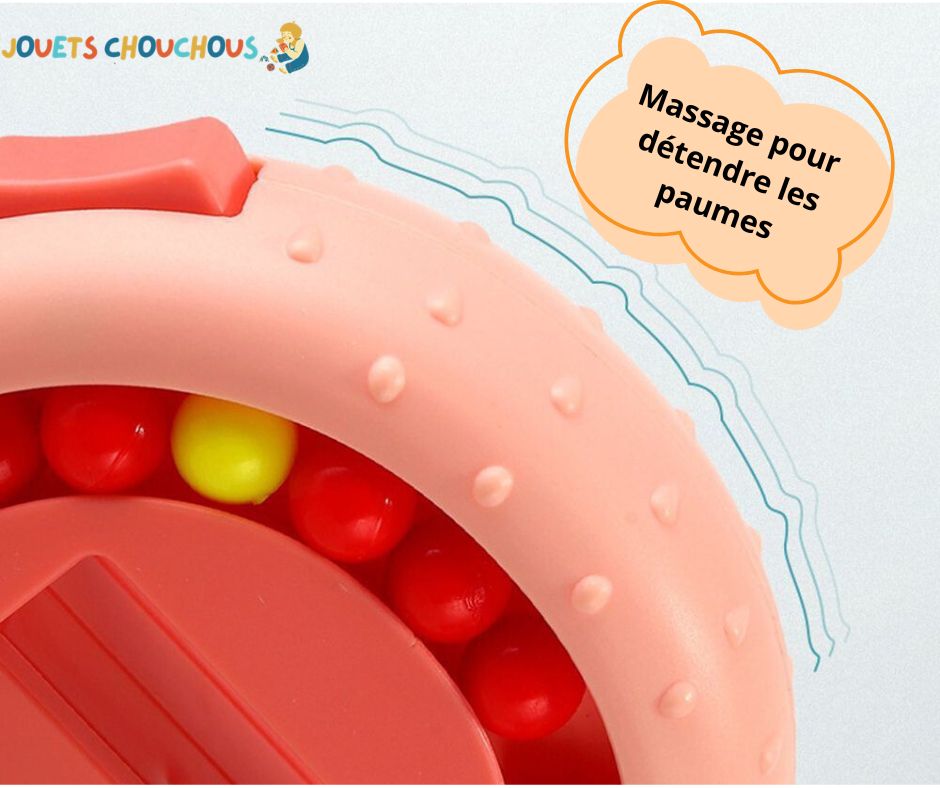Gros plan d'un casse tete rotatif rose avec des billes rouges et jaunes. Texte : "Massage pour détendre les paumes"