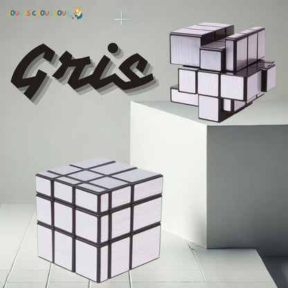Deux casse tete cubes gris, l'un classique et l'autre déformé, avec le texte "Gris"